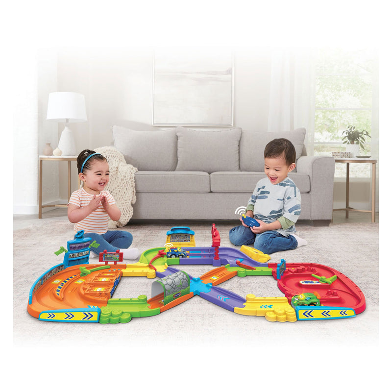 Load image into Gallery viewer, Vtech toet toet auto's- mijn eerste interactieve circuit incl. 2 auto's