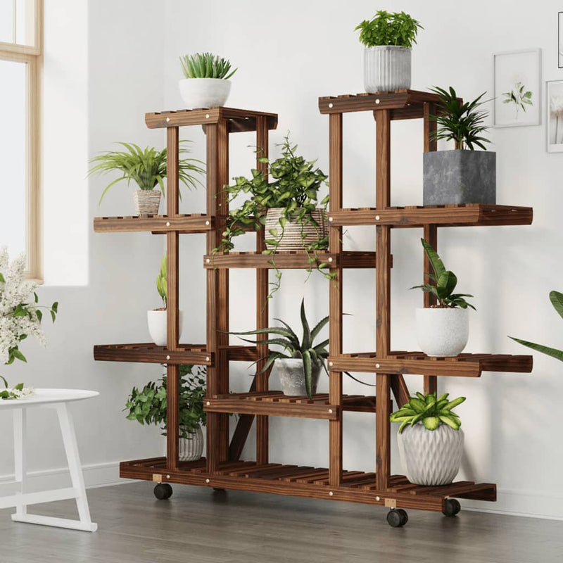 Load image into Gallery viewer, Vidaxl plantenstandaard met wielen 110x25x115 cm massief vurenhout