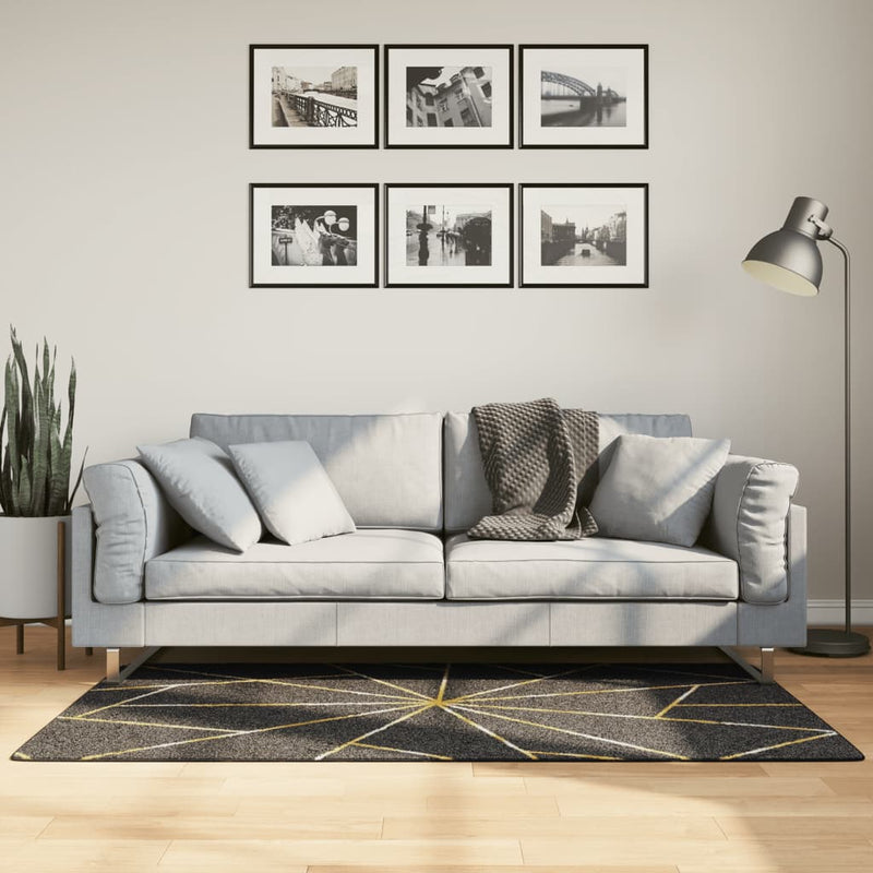 Load image into Gallery viewer, Vidaxl vloerkleed wasbaar anti-slip 80x150 cm zwart en goudkleurig