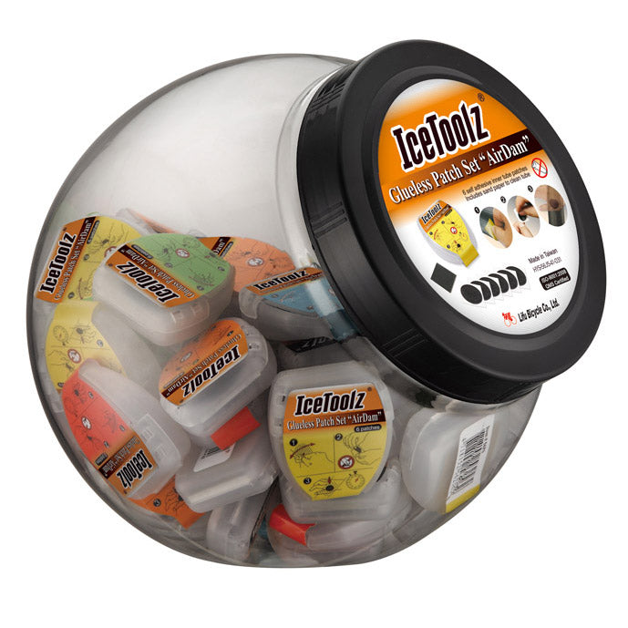 Afbeelding laden in galerijviewer, IceToolz Zelfklevende bandenplakkers AirDam 24056J5 50 doosjes à 6 stuks (in pot)