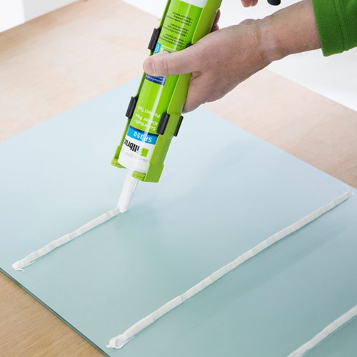 Load image into Gallery viewer, Illbruck sp350 high tack pro lijmkit | zwart | 310 ml | 12 stuks - sp350396591