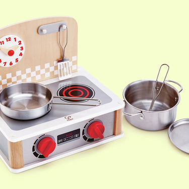 Hape 2-in-1 keuken barbecue set - speelgoedkeuken met metalen accessoires, klikknopjes en klok, vanaf 3 jaar