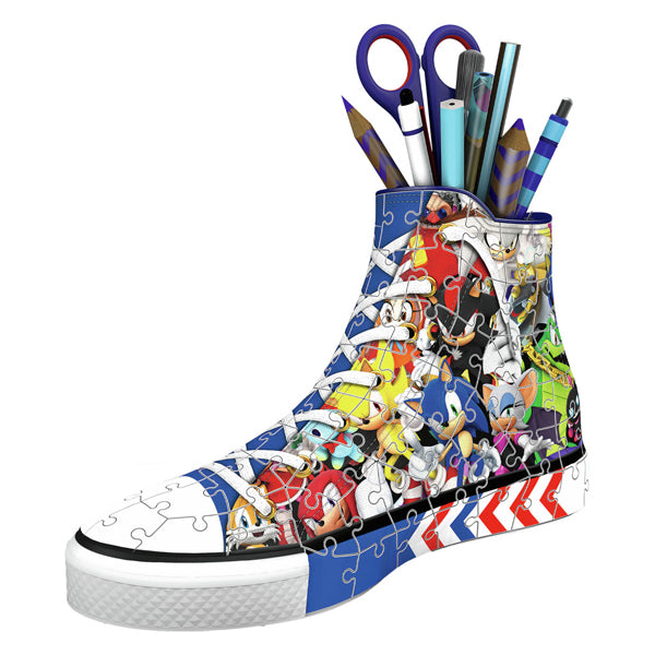 Load image into Gallery viewer, Ravensburger 3d puzzel pennenbak sonic the hedgehog sneaker 108 stukjes.
