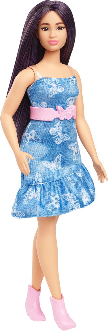 Barbie fashionista popwith purple hair.