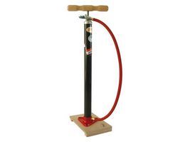 bicycle pump on wooden board with Dunlop valve