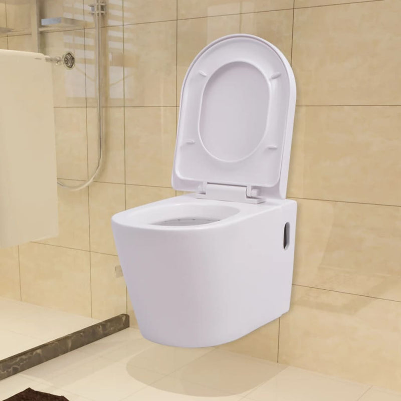 Load image into Gallery viewer, VidaXL Hangend toilet met verborgen stortbak keramiek wit
