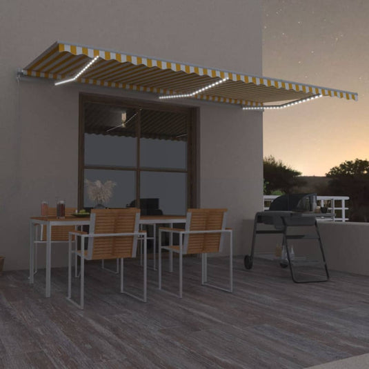 VidaXL Luifel handmatig uittrekbaar met LED 600x350 cm geel en wit