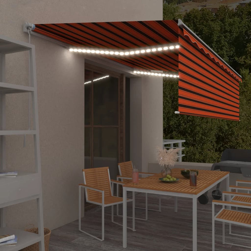 Load image into Gallery viewer, VidaXL Luifel handmatig uittrekbaar rolgordijn LED 5x3 m oranje bruin
