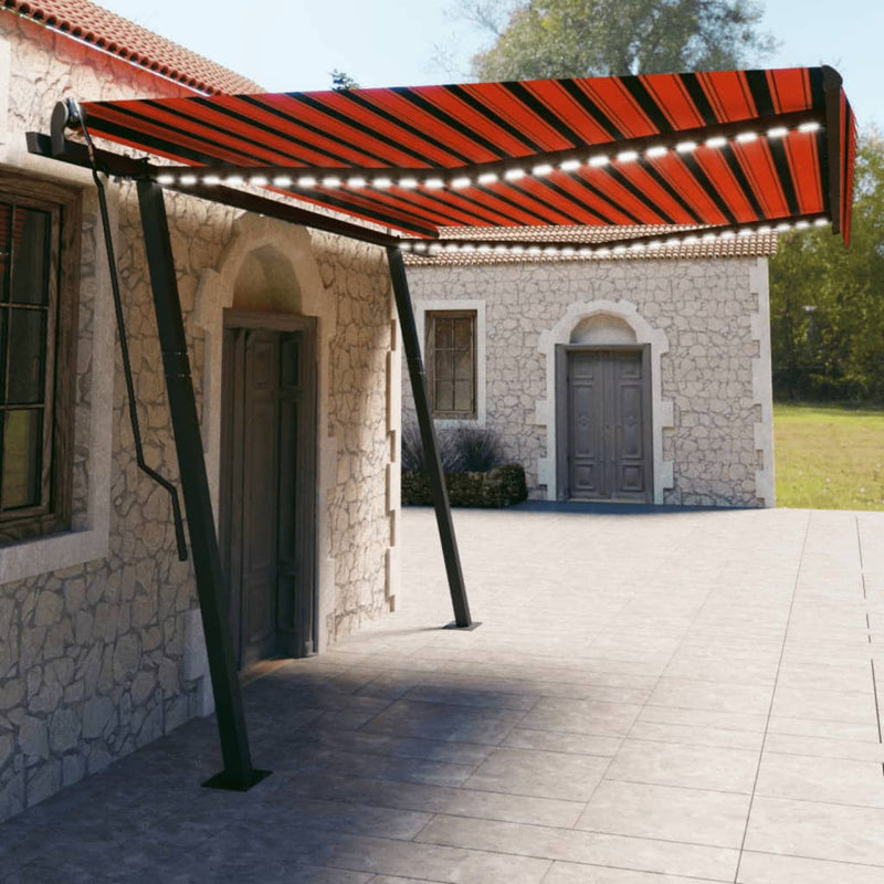 Load image into Gallery viewer, VidaXL Luifel automatisch met LED en windsensor 4,5x3 m oranje bruin
