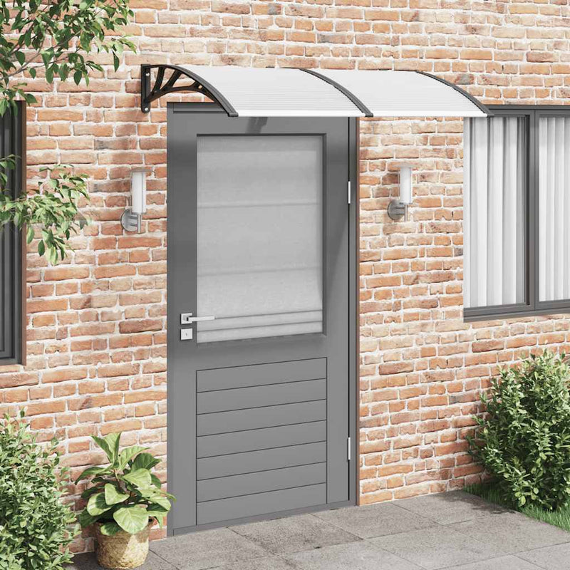 Load image into Gallery viewer, Vidaxl deurluifel 150x75 cm polycarbonaat zwart en transparant
