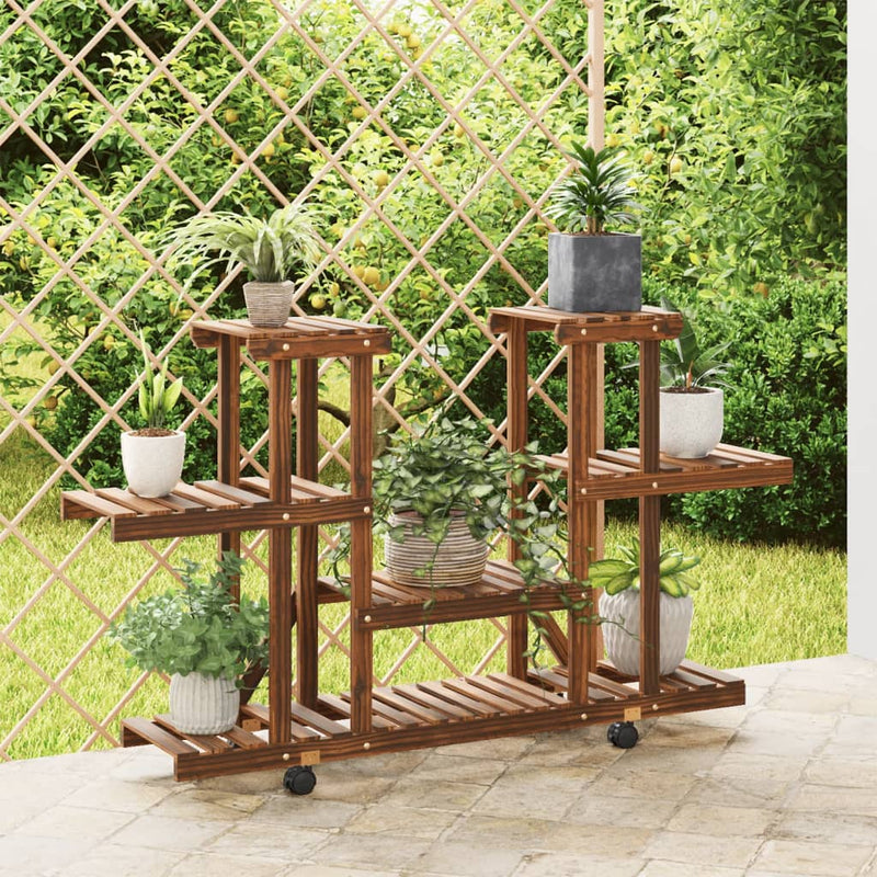 Load image into Gallery viewer, Vidaxl plantenstandaard met wielen 110x25x78 cm massief vurenhout
