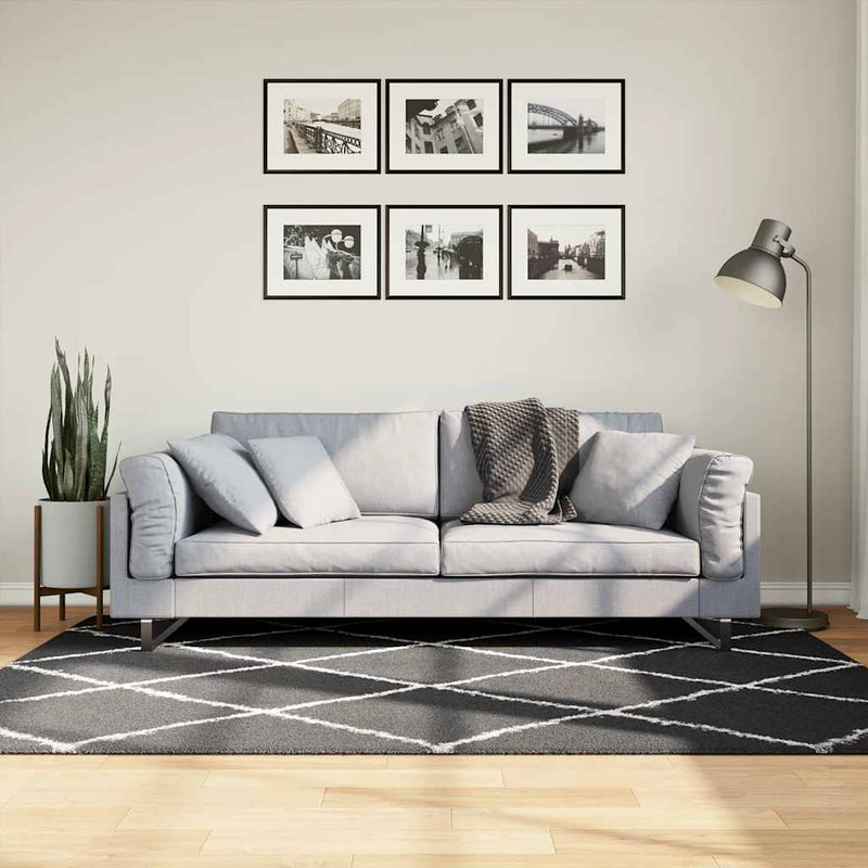 Load image into Gallery viewer, Vidaxl vloerkleed shaggy hoogpolig modern 140x200 cm zwart en crème
