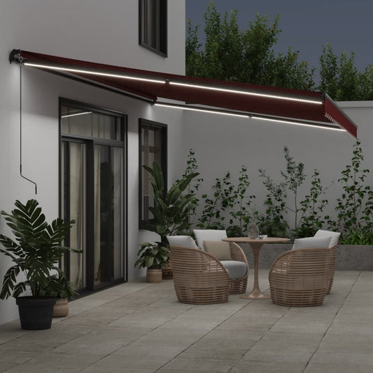VidaXL Luifel handmatig uittrekbaar met LED's 600x350 cm bordeauxrood
