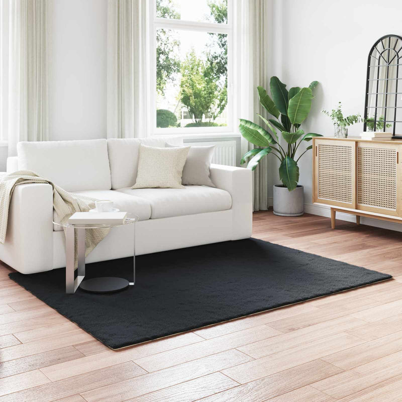 Load image into Gallery viewer, Vidaxl nep konijnenbont tapijt olite zwart 140 x 200 cm polyester
