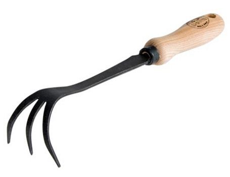 De wit handhark met drie tanden - cultivator
