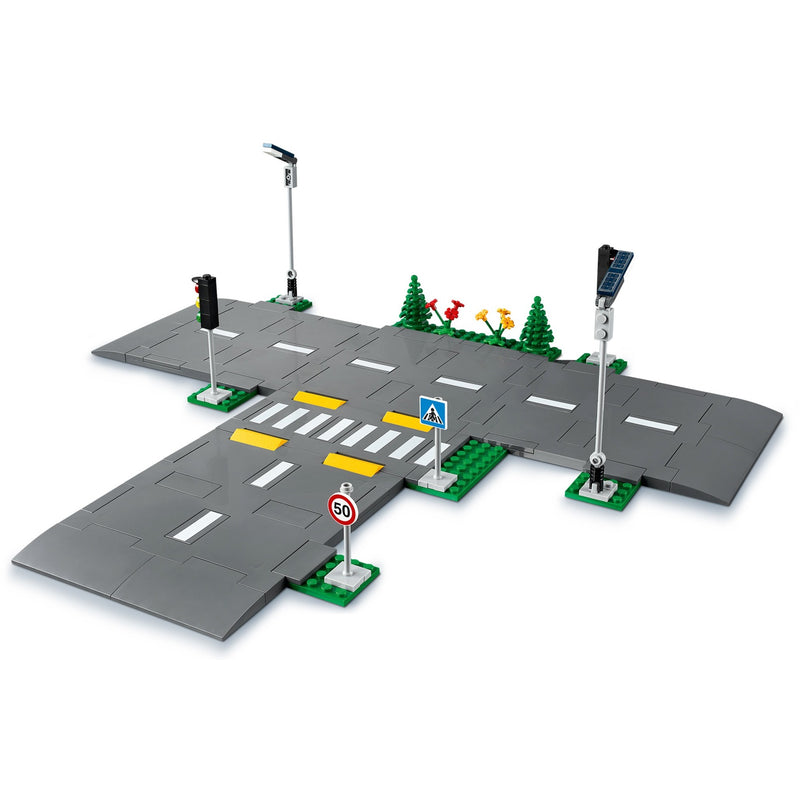 Load image into Gallery viewer, Lego ® city wegplaten 60304 bouwset; bouwbare speelgoedweg; maak de wegplaten vast aan je stad om deze uit te breiden; met lantaarnpalen, stoplichten, verkeersborden, bomen en planten, verkeersdrempels en een zebrapad (112 onderdelen)
