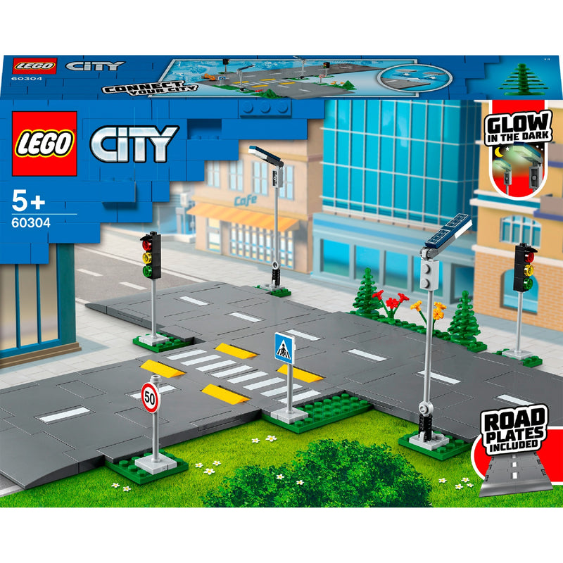 Load image into Gallery viewer, Lego ® city wegplaten 60304 bouwset; bouwbare speelgoedweg; maak de wegplaten vast aan je stad om deze uit te breiden; met lantaarnpalen, stoplichten, verkeersborden, bomen en planten, verkeersdrempels en een zebrapad (112 onderdelen)
