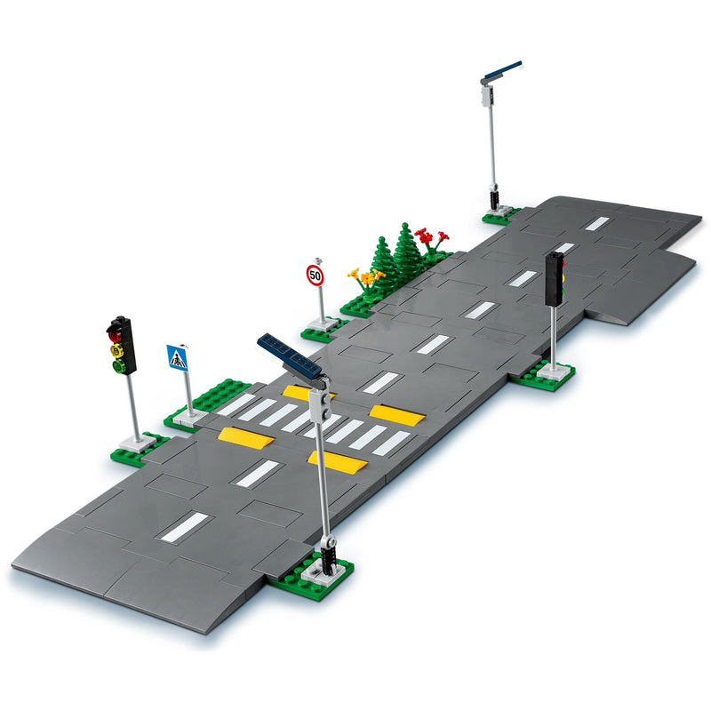 Load image into Gallery viewer, Lego ® city wegplaten 60304 bouwset; bouwbare speelgoedweg; maak de wegplaten vast aan je stad om deze uit te breiden; met lantaarnpalen, stoplichten, verkeersborden, bomen en planten, verkeersdrempels en een zebrapad (112 onderdelen)
